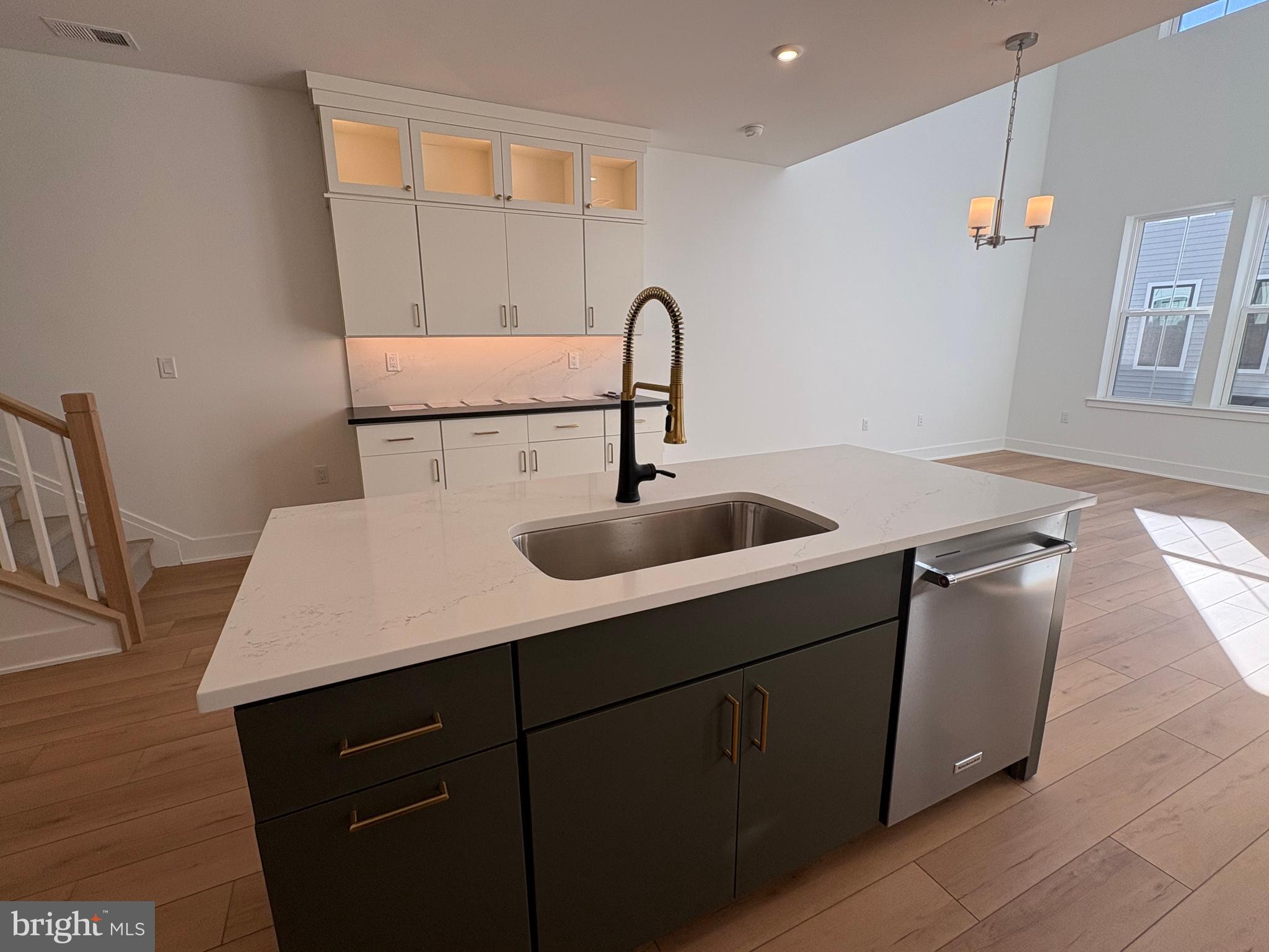 8207 Donatello Drive, Unit 872 Princeton, NJ 08540 - Photo 5 of 27 a bathroom with a sink and a mirror