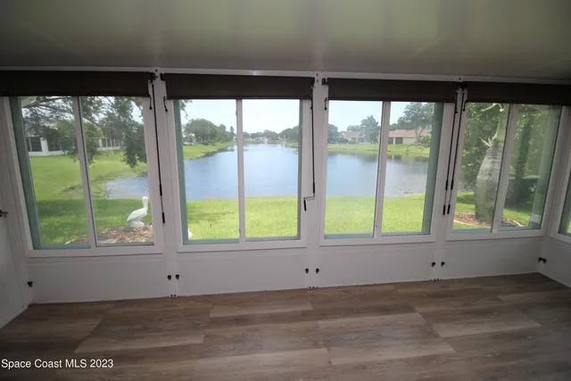 a view of a room that has a window