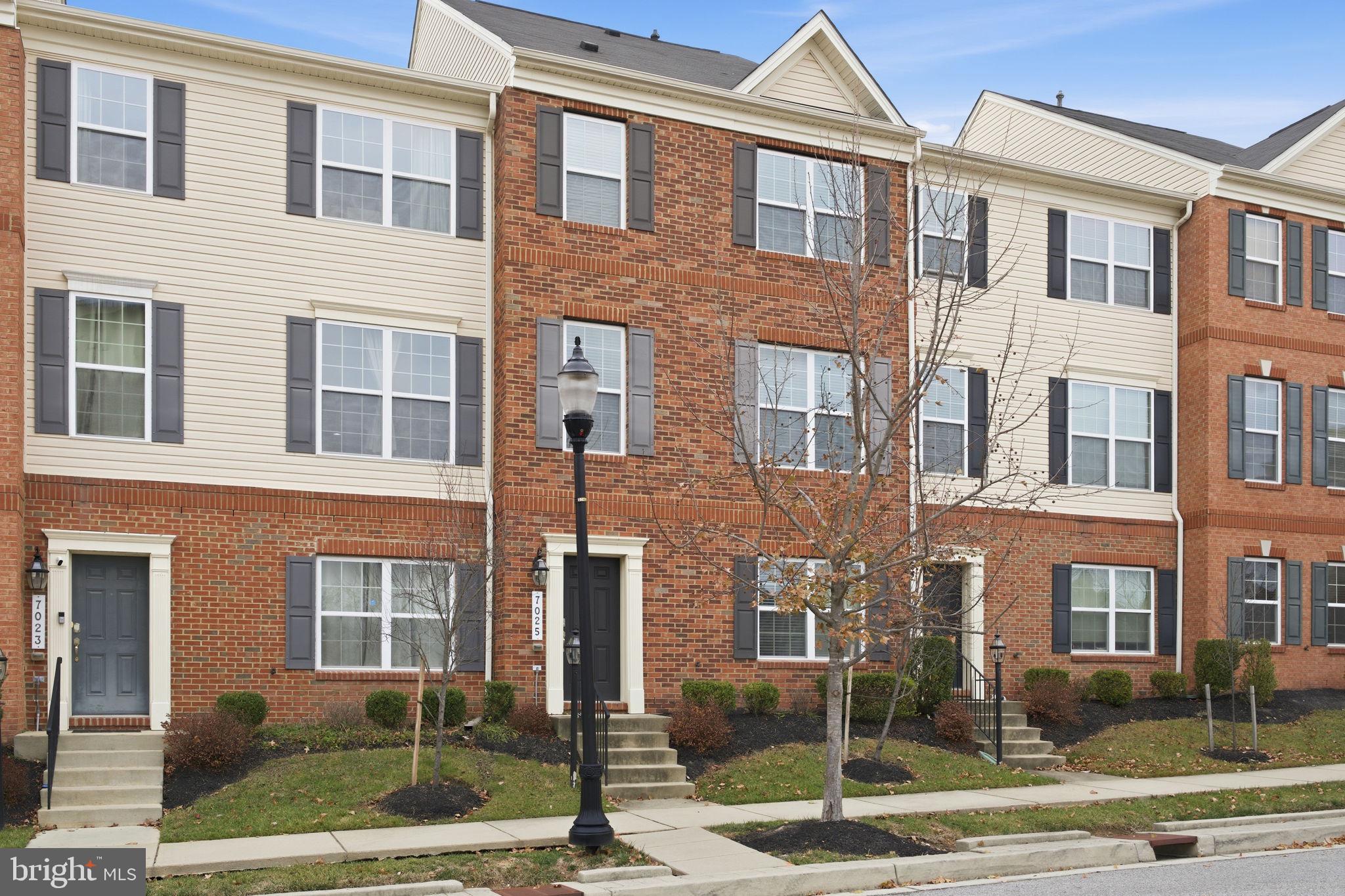 7025 Southmoor Street Hanover, MD 21076 - Photo 2 of 35 a front view of a brick building