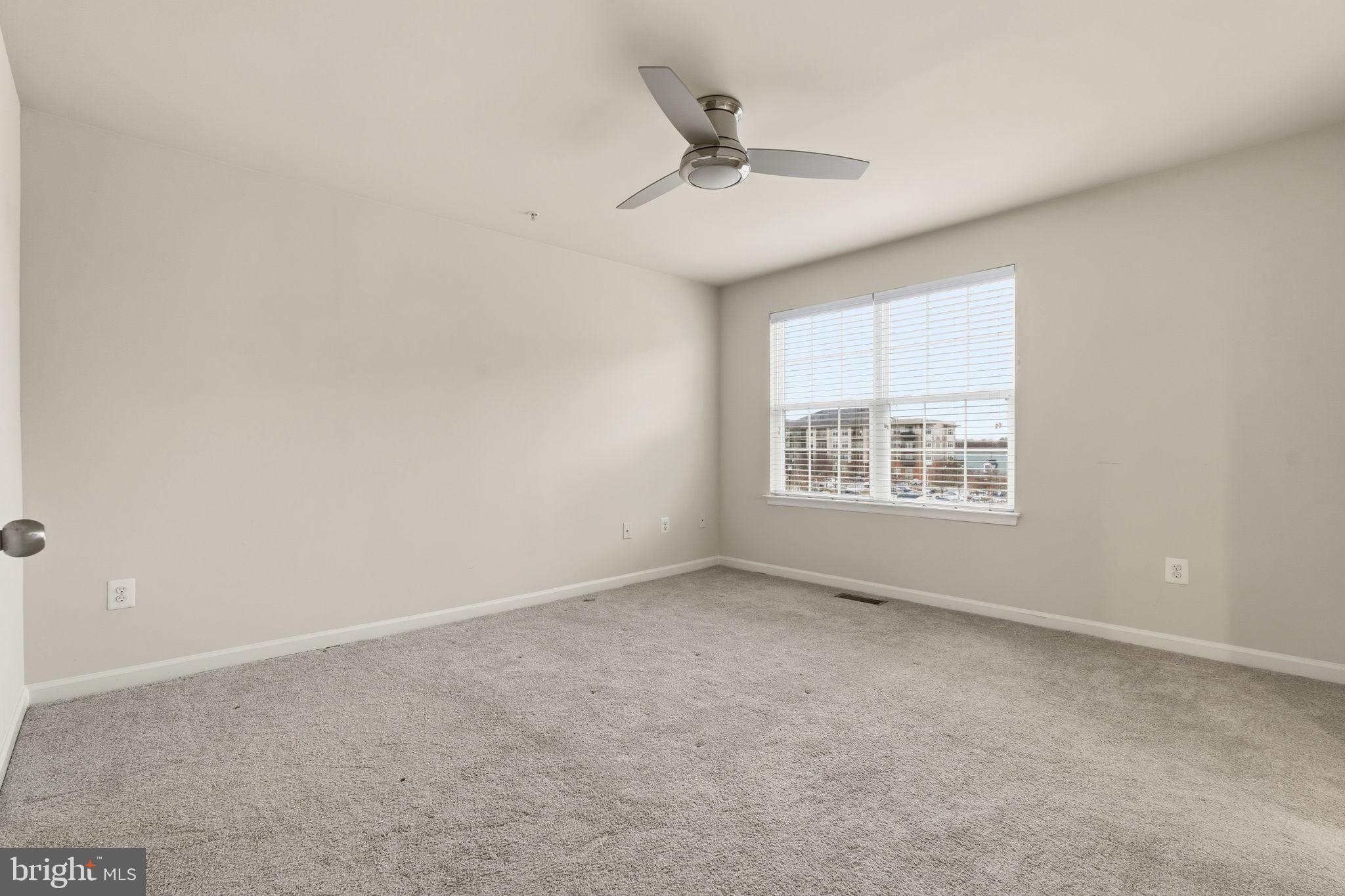 7025 Southmoor Street Hanover, MD 21076 - Photo 21 of 35 an empty room with a window