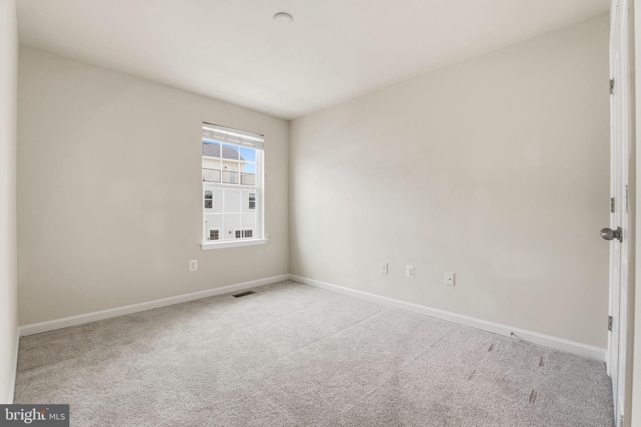 7025 Southmoor Street Hanover, MD 21076 - Photo 27 of 35 a view of an empty room with a window
