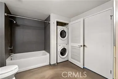 a stove top oven sitting inside of a kitchen