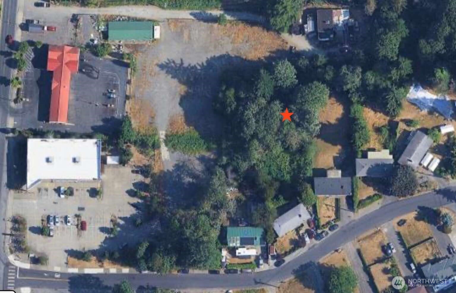 0 South 211th Street Seattle, WA 98198 - Photo 3 of 3 an aerial view of residential houses with outdoor space