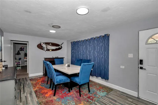 a view of a dining room with furniture