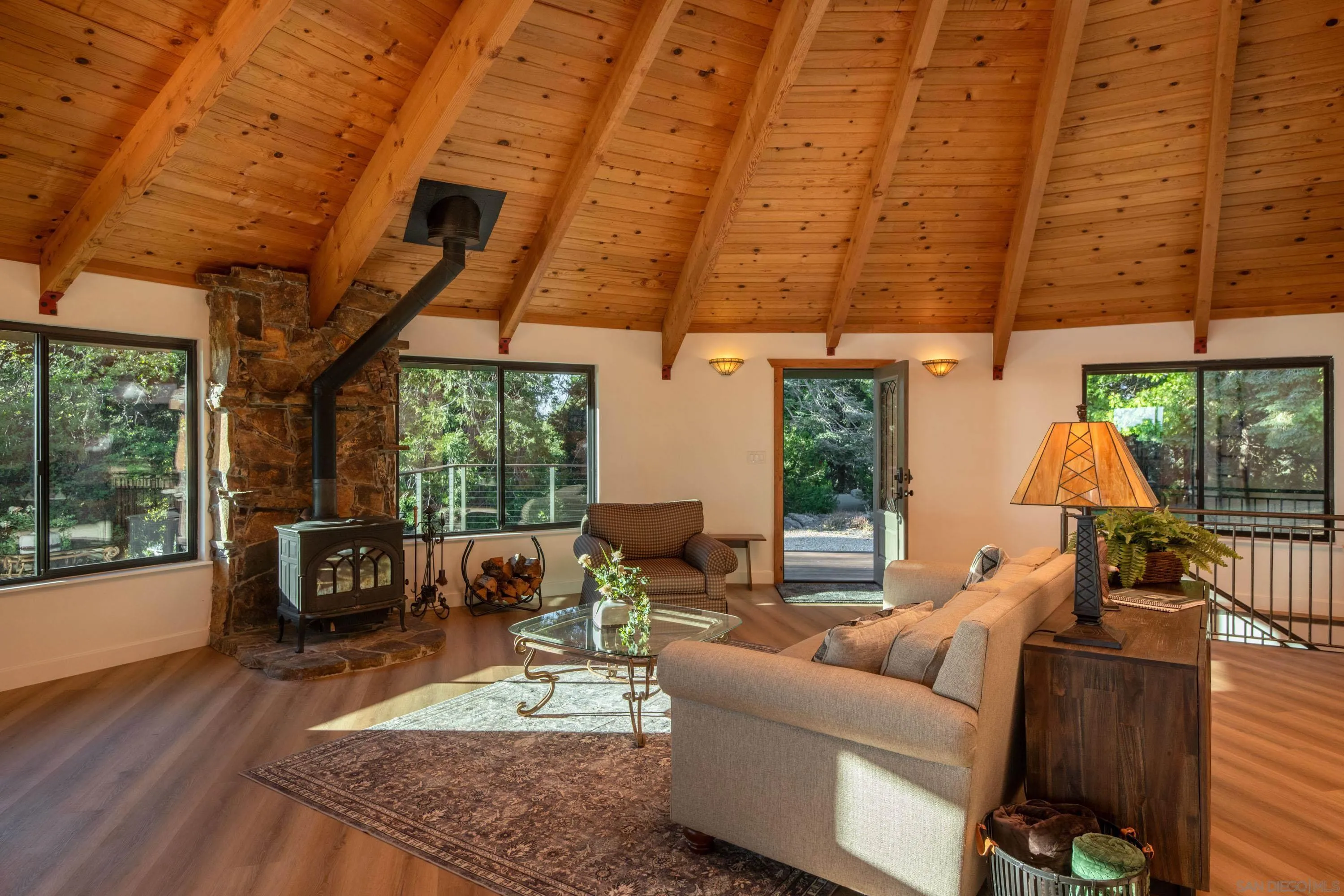 3413 Fern Meadow Road Palomar Mountain, CA 92060 - Photo 11 of 38 a living room with furniture and a fireplace