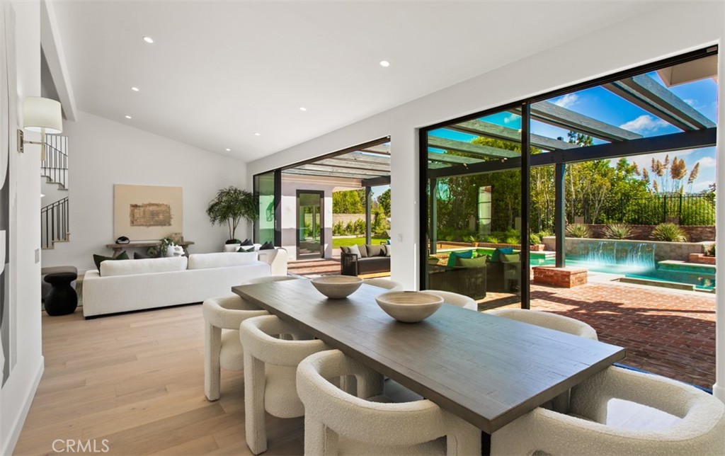 38 Royal St George Road Newport Beach, CA 92660 - Photo 16 of 44 a outdoor dining space with furniture and garden view