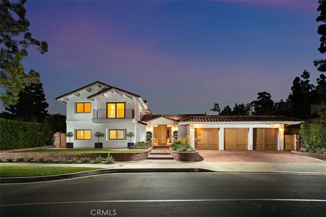a view of multiple houses with a street