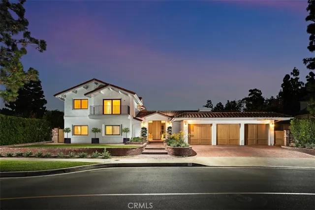 a view of multiple houses with a street
