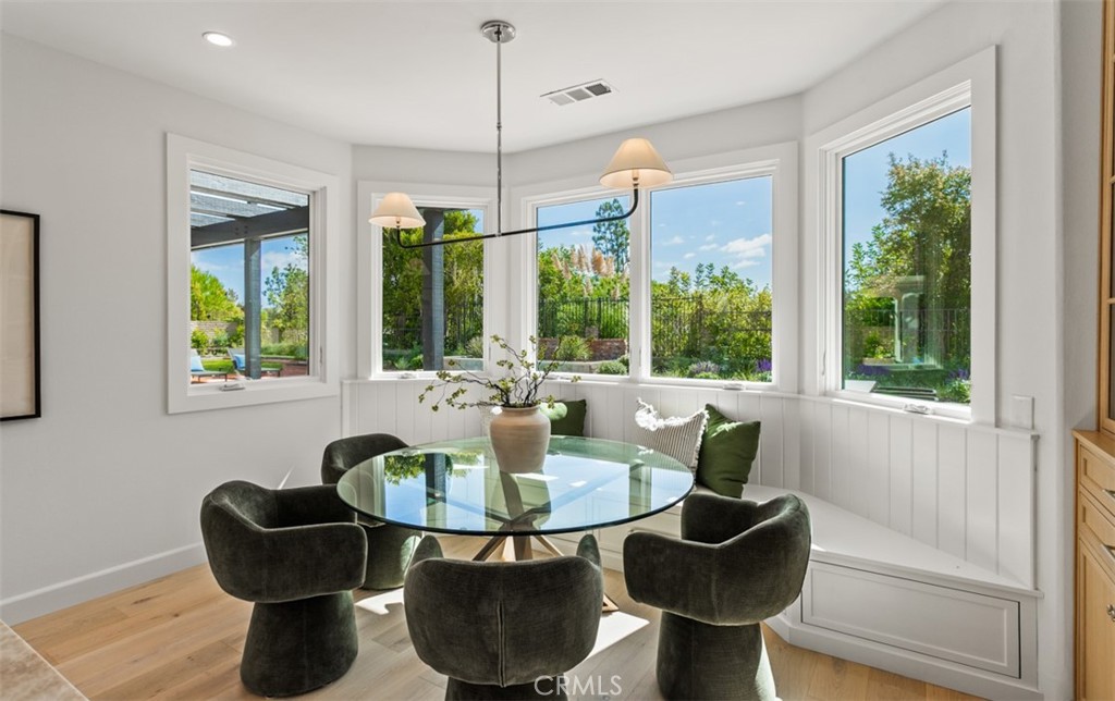 38 Royal St George Road Newport Beach, CA 92660 - Photo 21 of 44 a dining room with furniture and a large window
