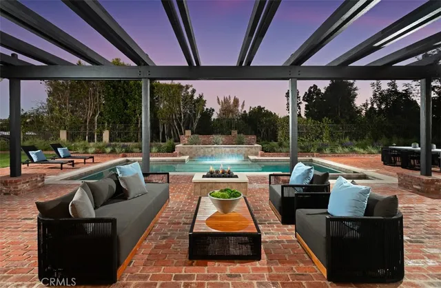 a patio with patio couch and table