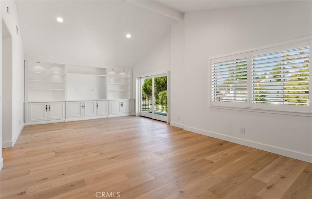 38 Royal St George Road Newport Beach, CA 92660 - Photo 38 of 44 a view of an empty room with wooden floor and a window