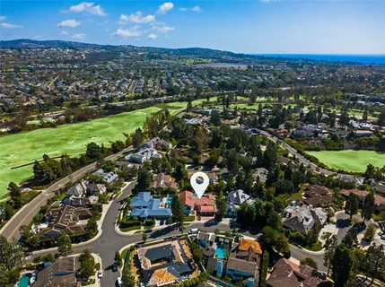 an aerial view of a city with lots of residential buildings