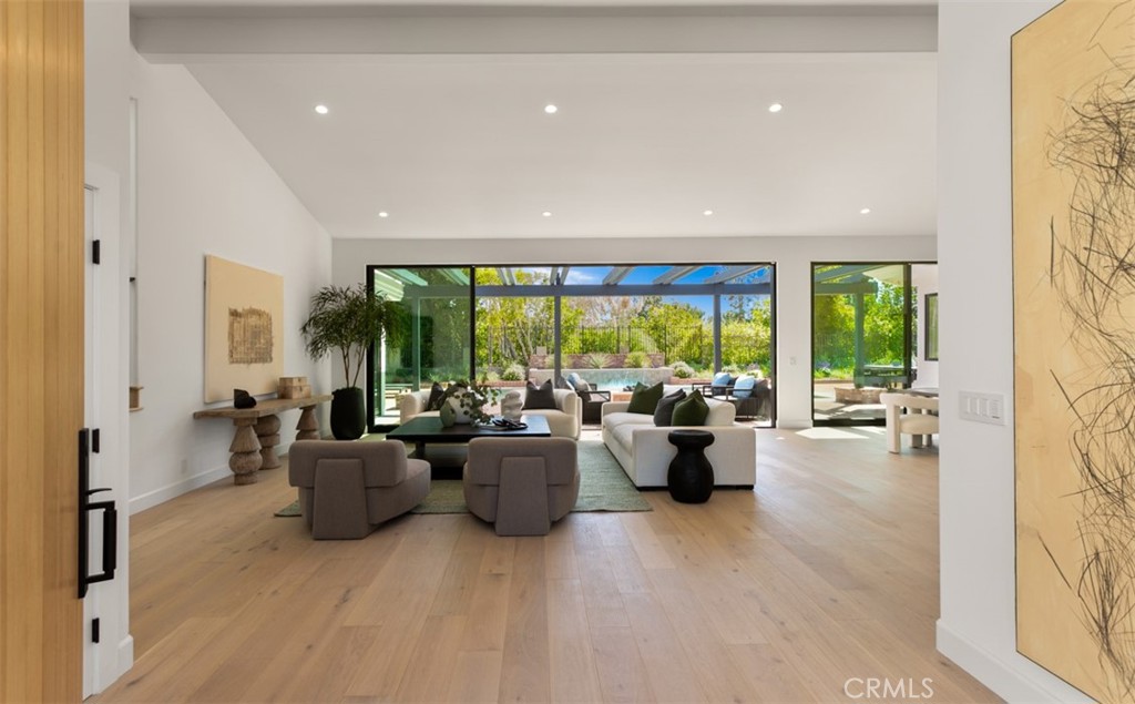 38 Royal St George Road Newport Beach, CA 92660 - Photo 6 of 44 a living room with furniture and large windows