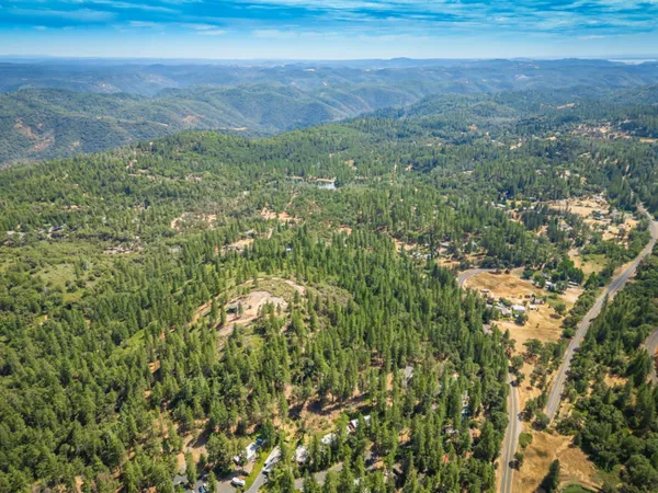 a view of a yard with an outdoor space