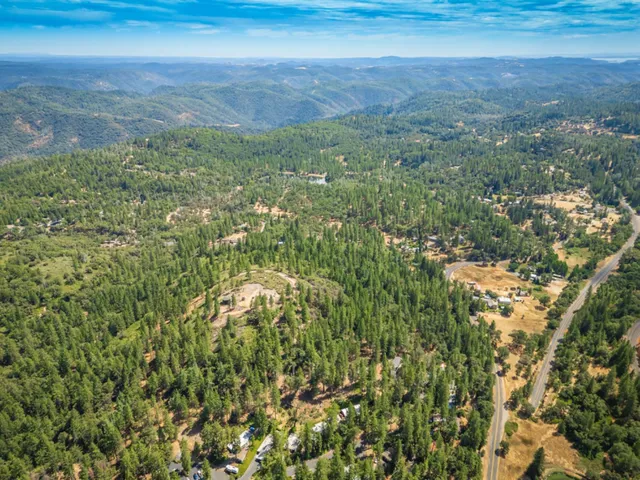 a view of a yard with an outdoor space