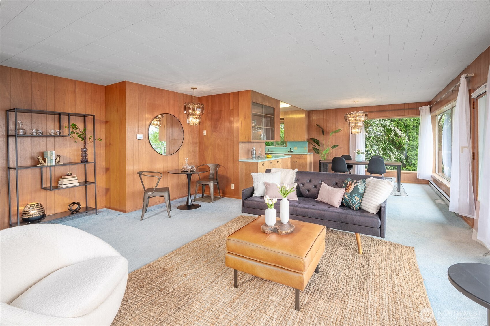 22617 Kingsbury Road Southwest Vashon, WA 98070 - Photo 11 of 29 a living room with furniture and a large window