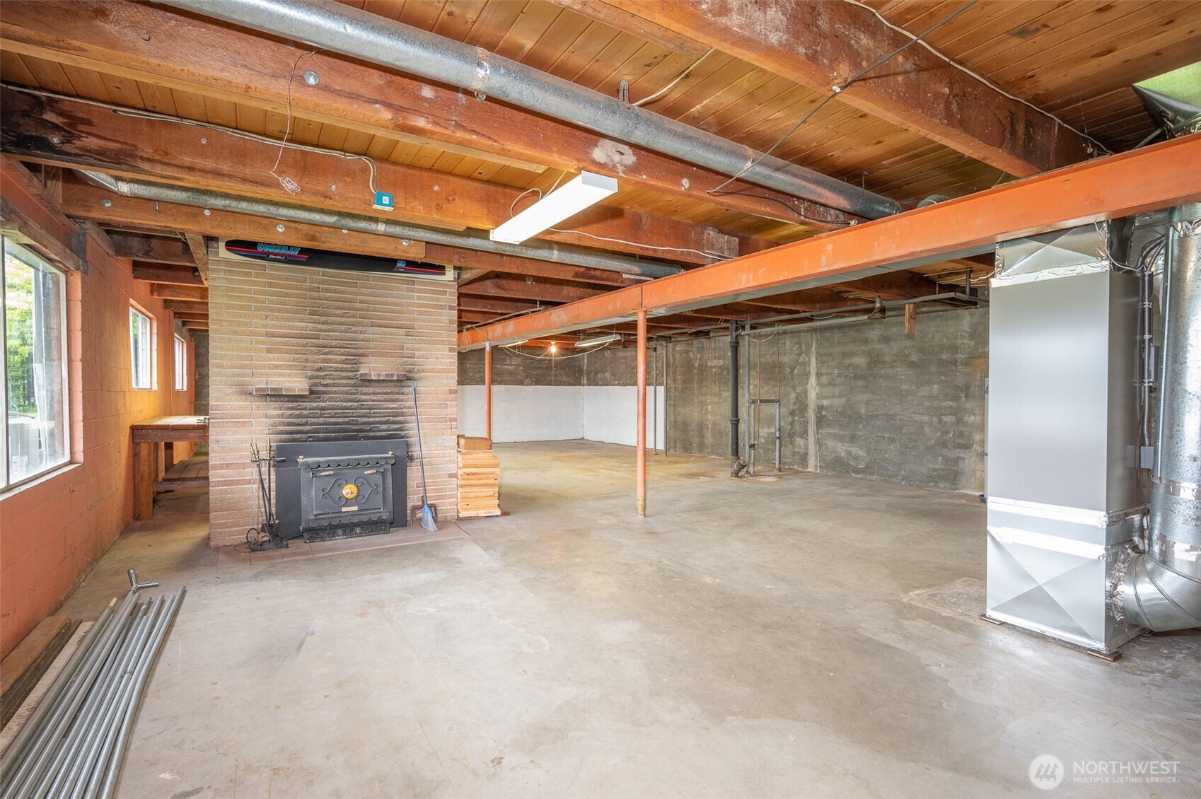 22617 Kingsbury Road Southwest Vashon, WA 98070 - Photo 24 of 29 a view of an empty room with a fireplace