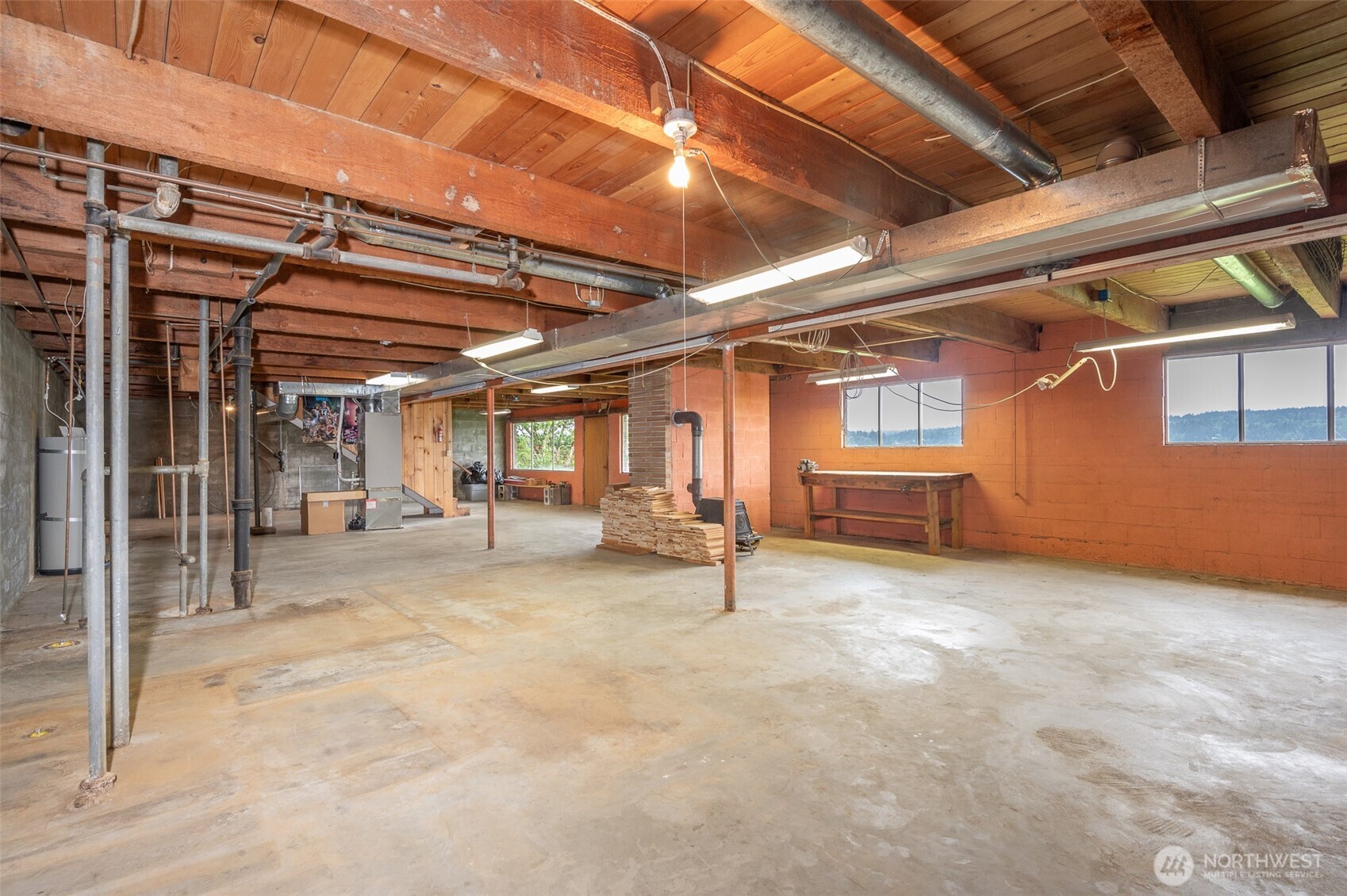 22617 Kingsbury Road Southwest Vashon, WA 98070 - Photo 26 of 29 a view of an empty room with a window
