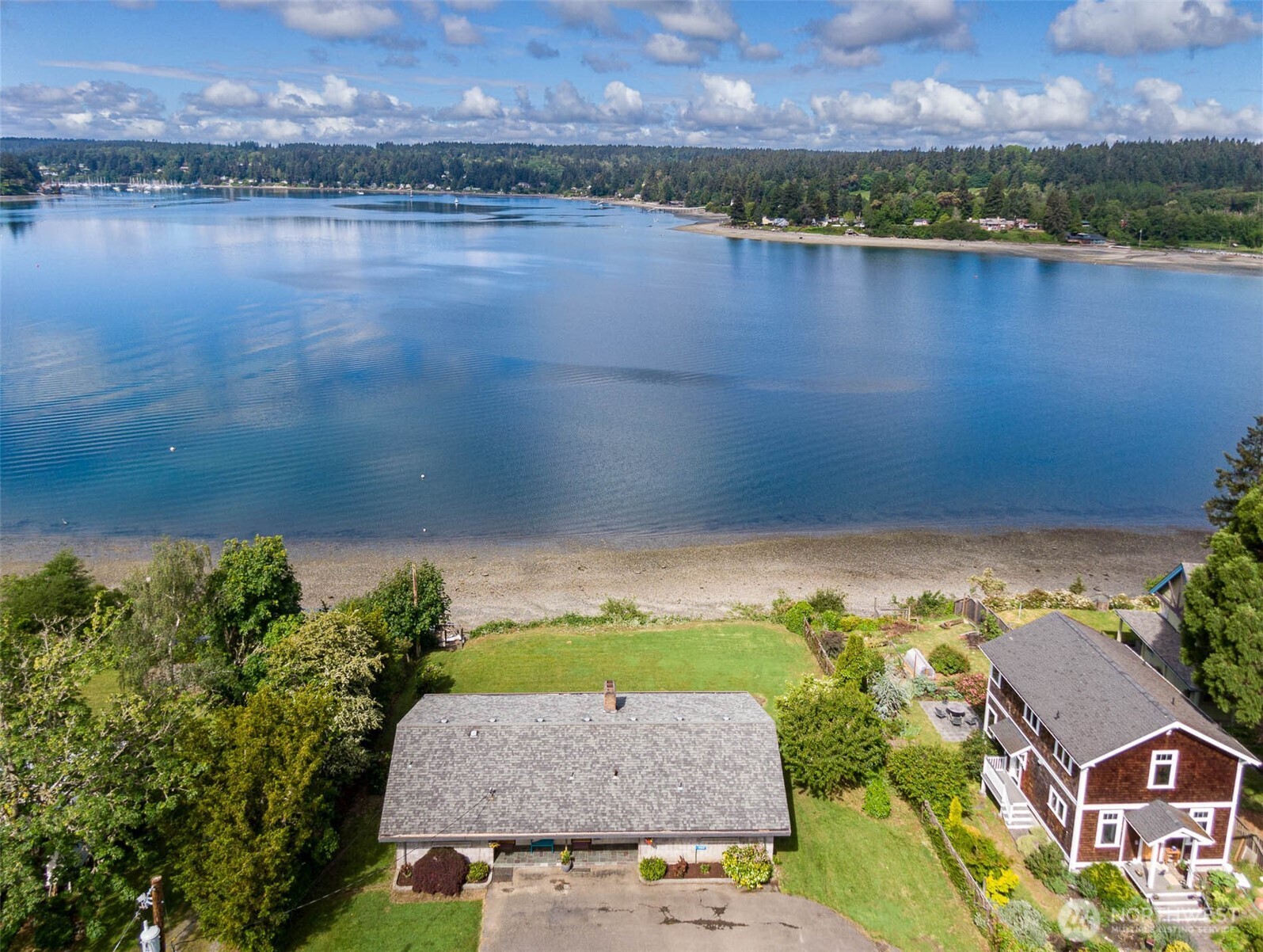 22617 Kingsbury Road Southwest Vashon, WA 98070 - Photo 4 of 29 an aerial view of residential houses with outdoor space and lake view