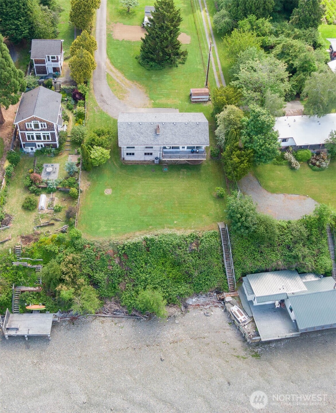 22617 Kingsbury Road Southwest Vashon, WA 98070 - Photo 5 of 29 a view of a backyard with a garden and plants