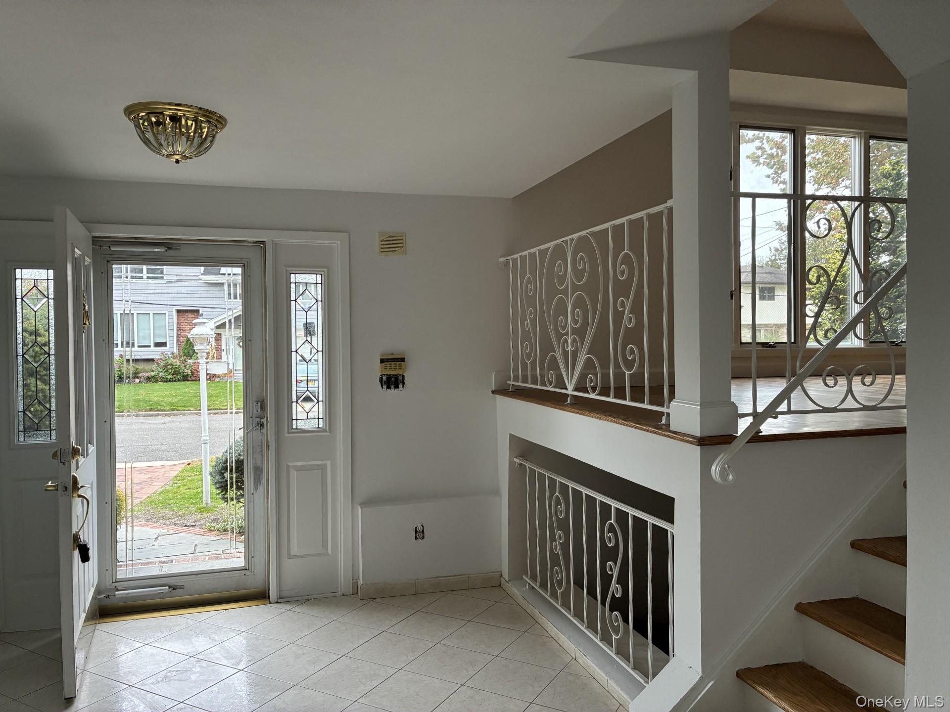 a view of an entryway with a glass door