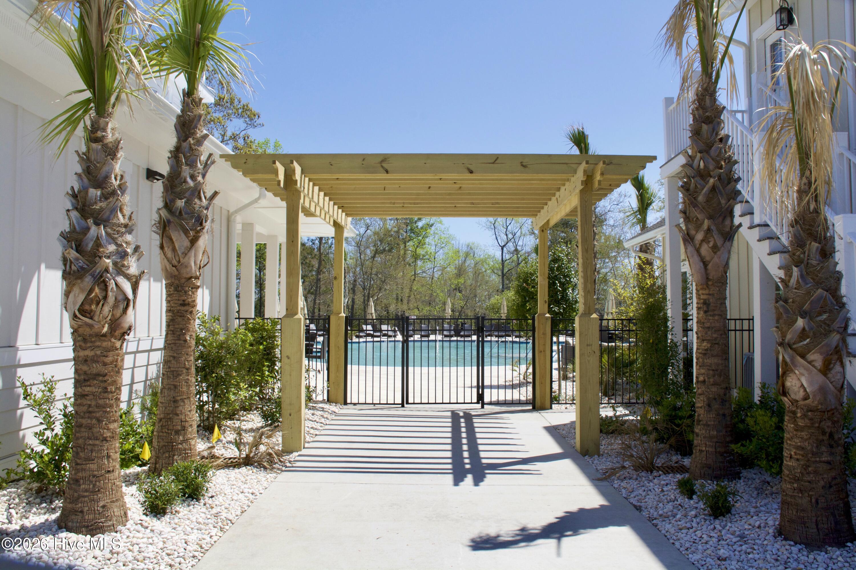 1327 Tilapia Way Calabash, NC 28467 - Photo 68 of 91 Pool entrance