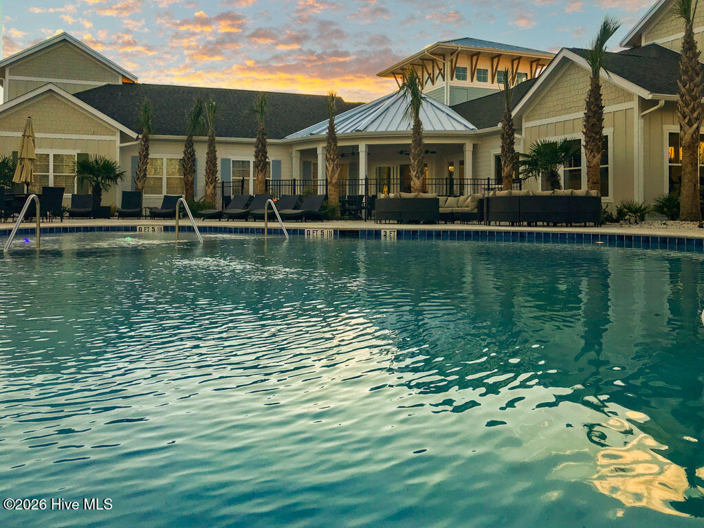 1327 Tilapia Way Calabash, NC 28467 - Photo 73 of 91 Kingfish-Bay-Pool-Dusk