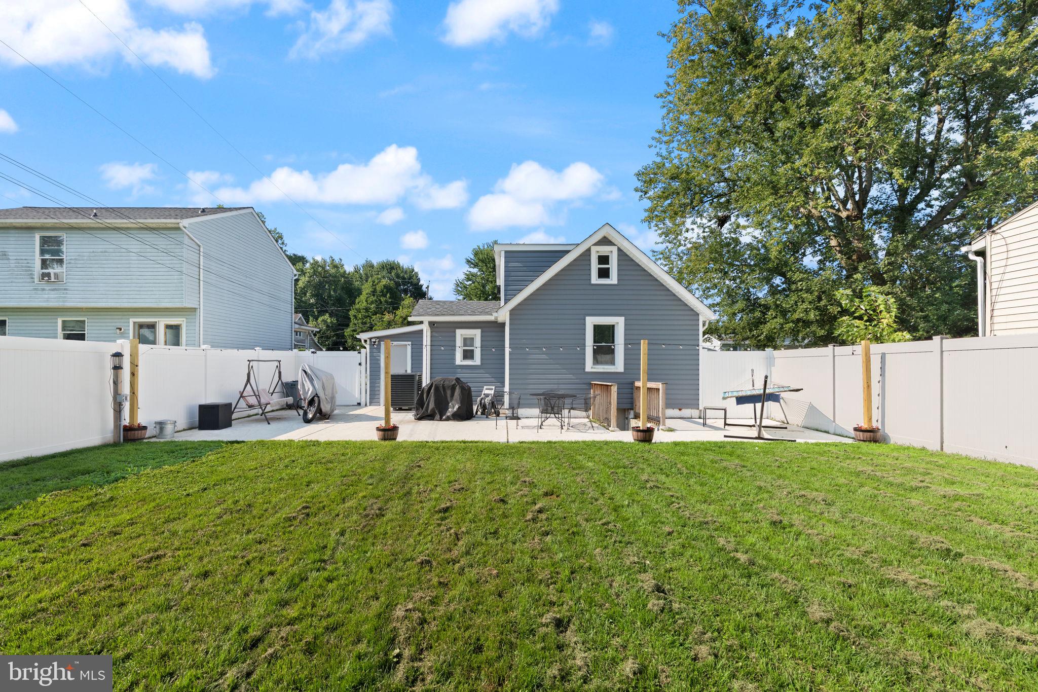 7410 Gunpowder Road Middle River, MD 21220 - Photo 3 of 23 Large flat backyard w/ large new patio & fencing