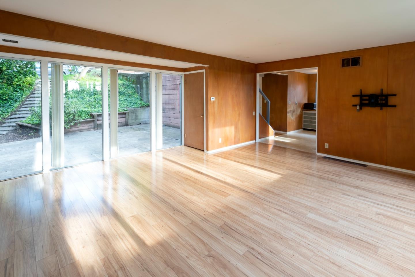 230 Fairlawn Drive Berkeley, CA 94708 - Photo 11 of 33 a view of empty room with wooden floor and fan