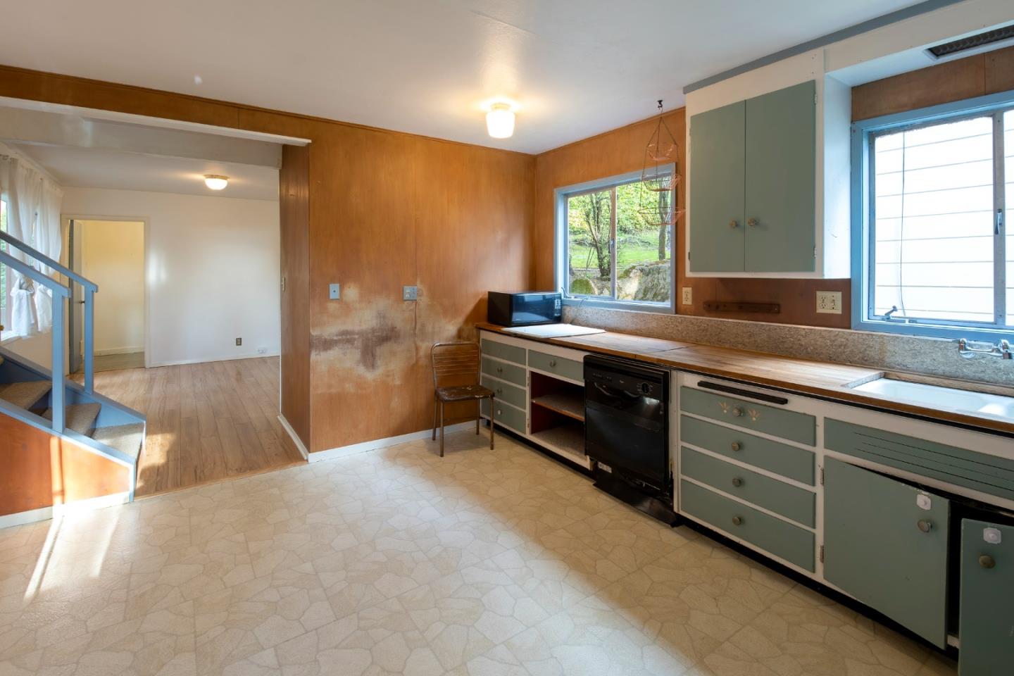 230 Fairlawn Drive Berkeley, CA 94708 - Photo 14 of 33 a spacious bathroom with a double vanity sink a large mirror and a bathtub