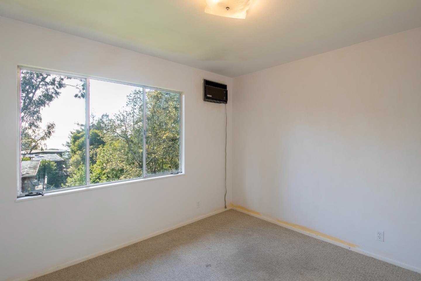 230 Fairlawn Drive Berkeley, CA 94708 - Photo 21 of 33 an empty room with a window