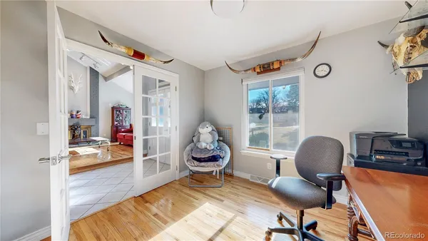a workspace with furniture and a window