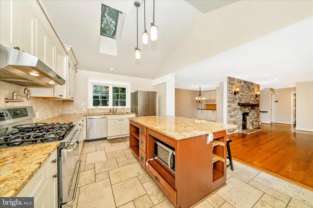 a kitchen with a stove and a sink