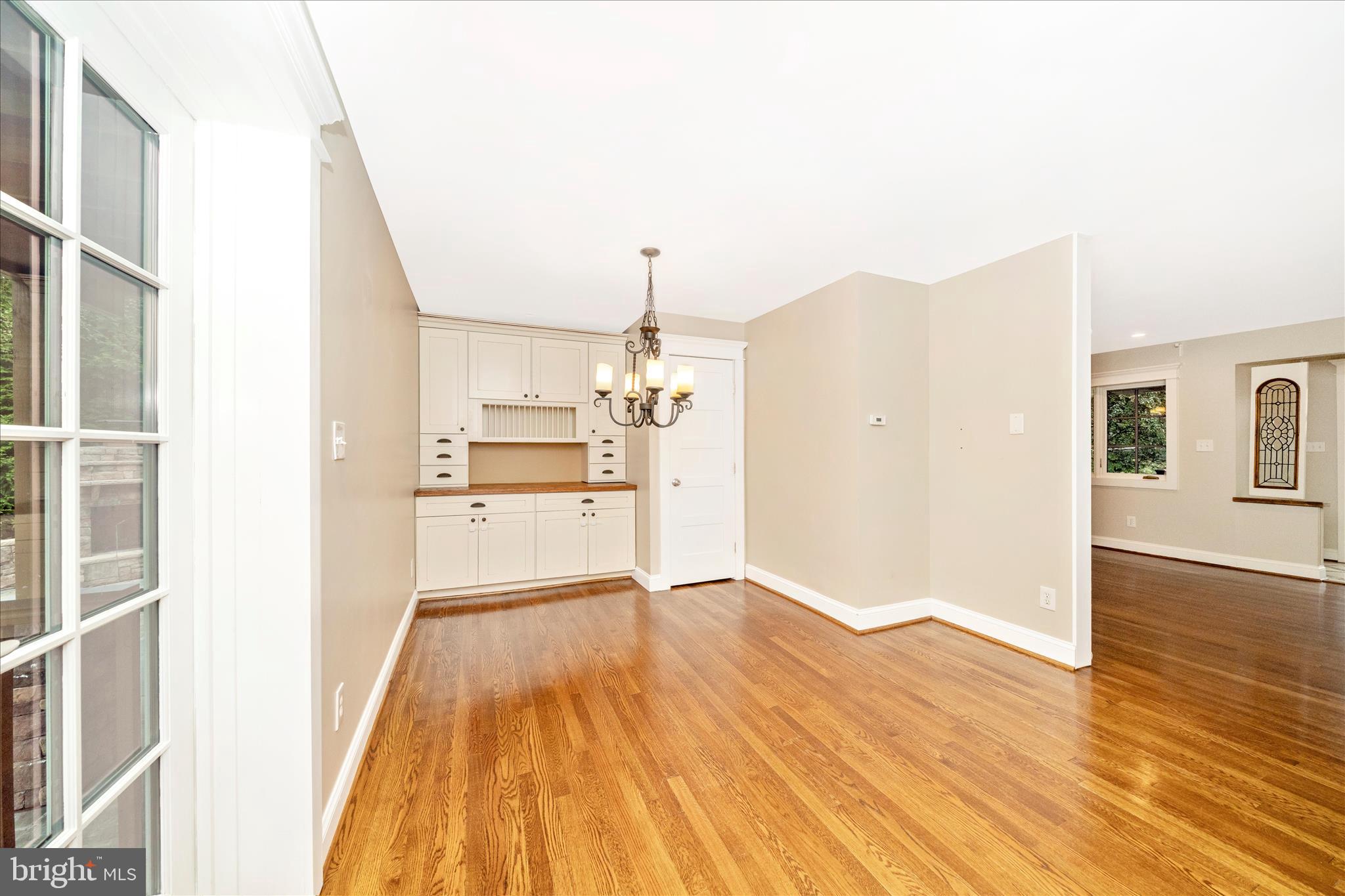 1925 Pagebrook Road Silver Spring, MD 20903 - Photo 16 of 60 a view of a kitchen with wooden floor and a kitchen