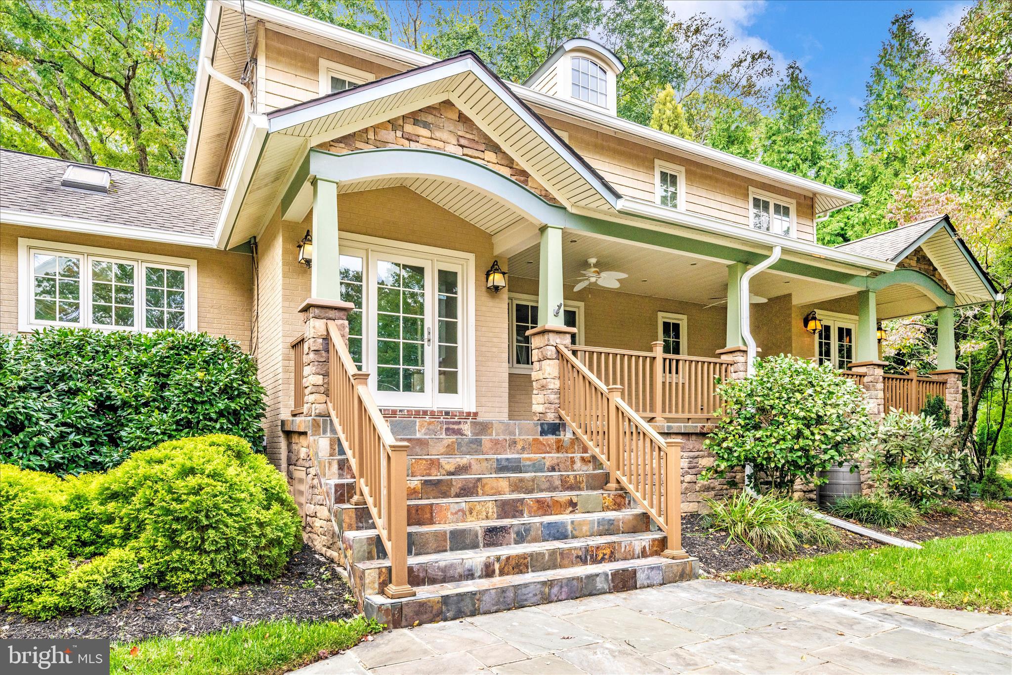 1925 Pagebrook Road Silver Spring, MD 20903 - Photo 2 of 60 a front view of a house with a porch