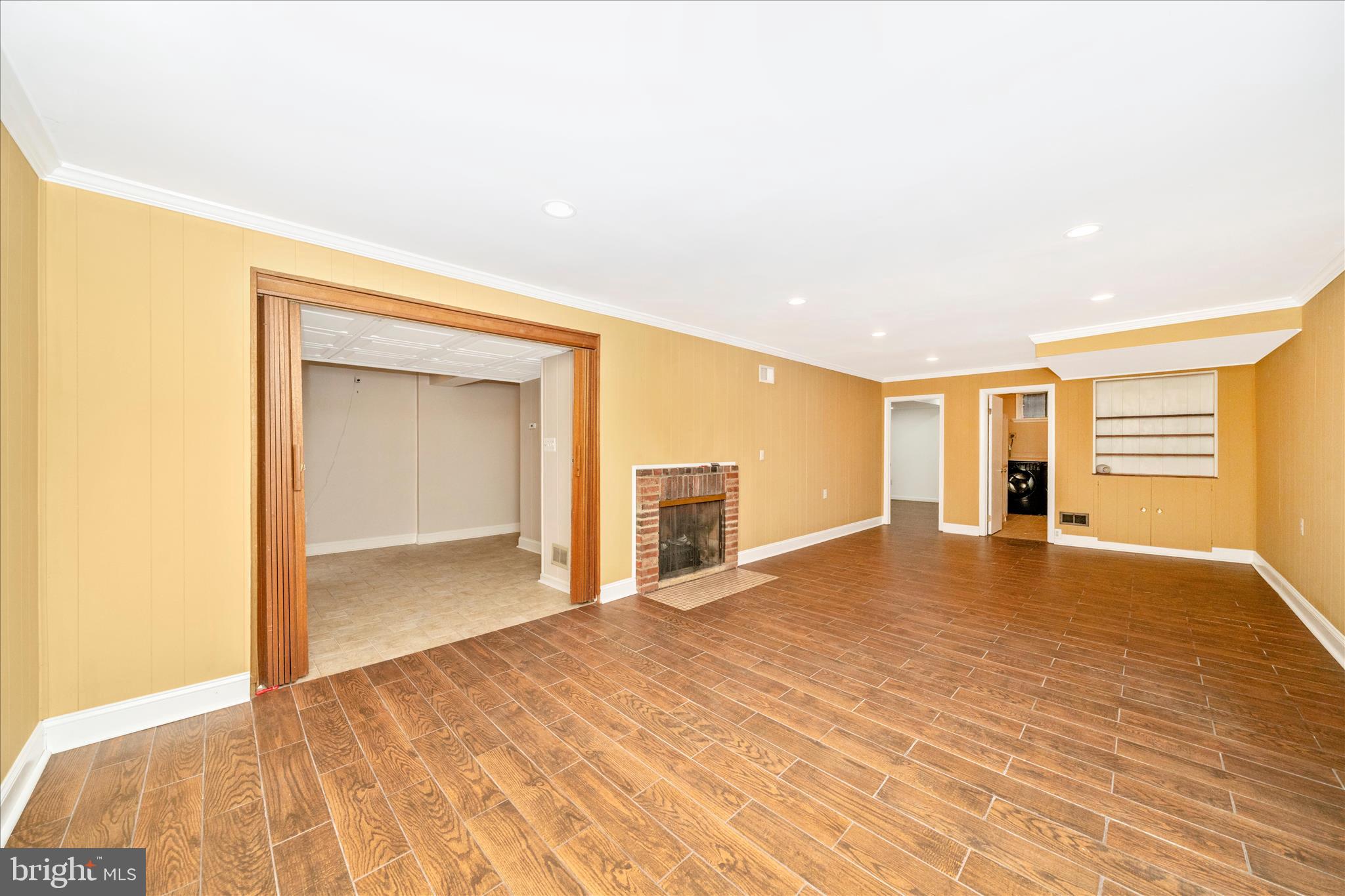 1925 Pagebrook Road Silver Spring, MD 20903 - Photo 38 of 60 a view of empty room with wooden floor and fan