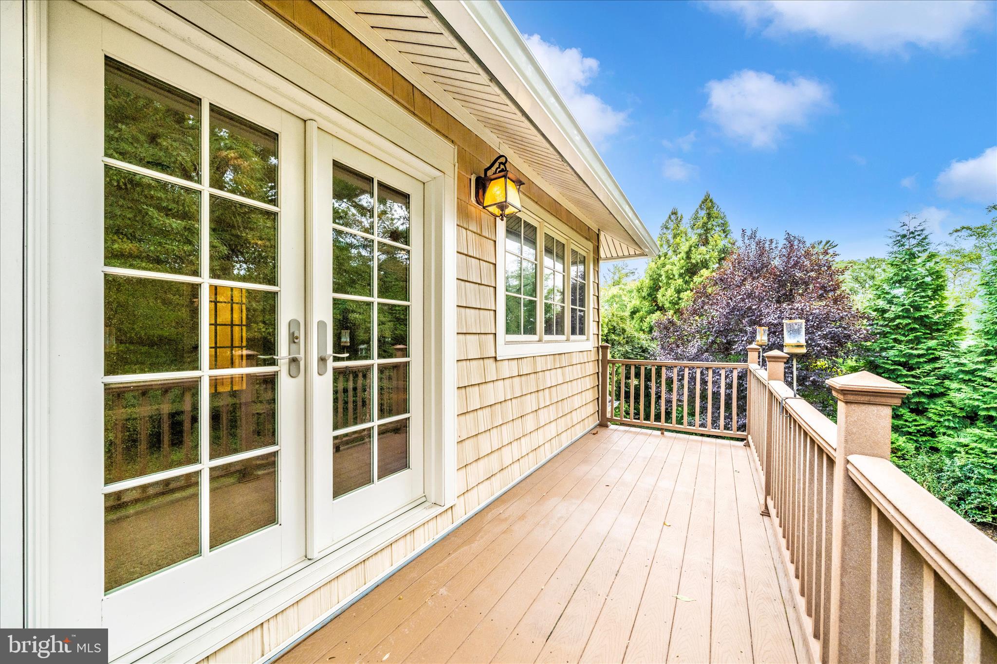 1925 Pagebrook Road Silver Spring, MD 20903 - Photo 43 of 60 a view of balcony with wooden floor and fence