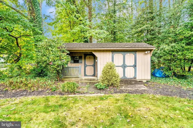 a view of a swimming pool with a yard