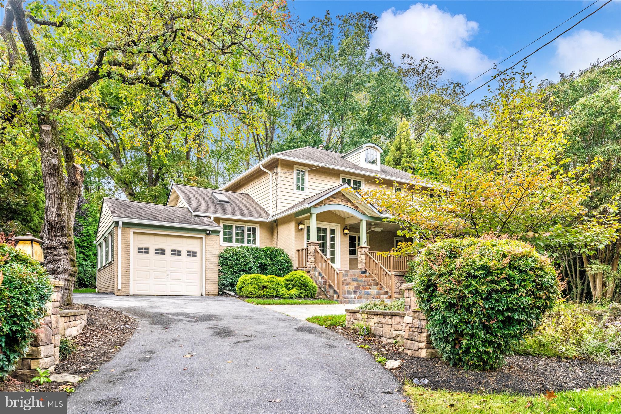 1925 Pagebrook Road Silver Spring, MD 20903 - Photo 54 of 60 a front view of a house with a garden