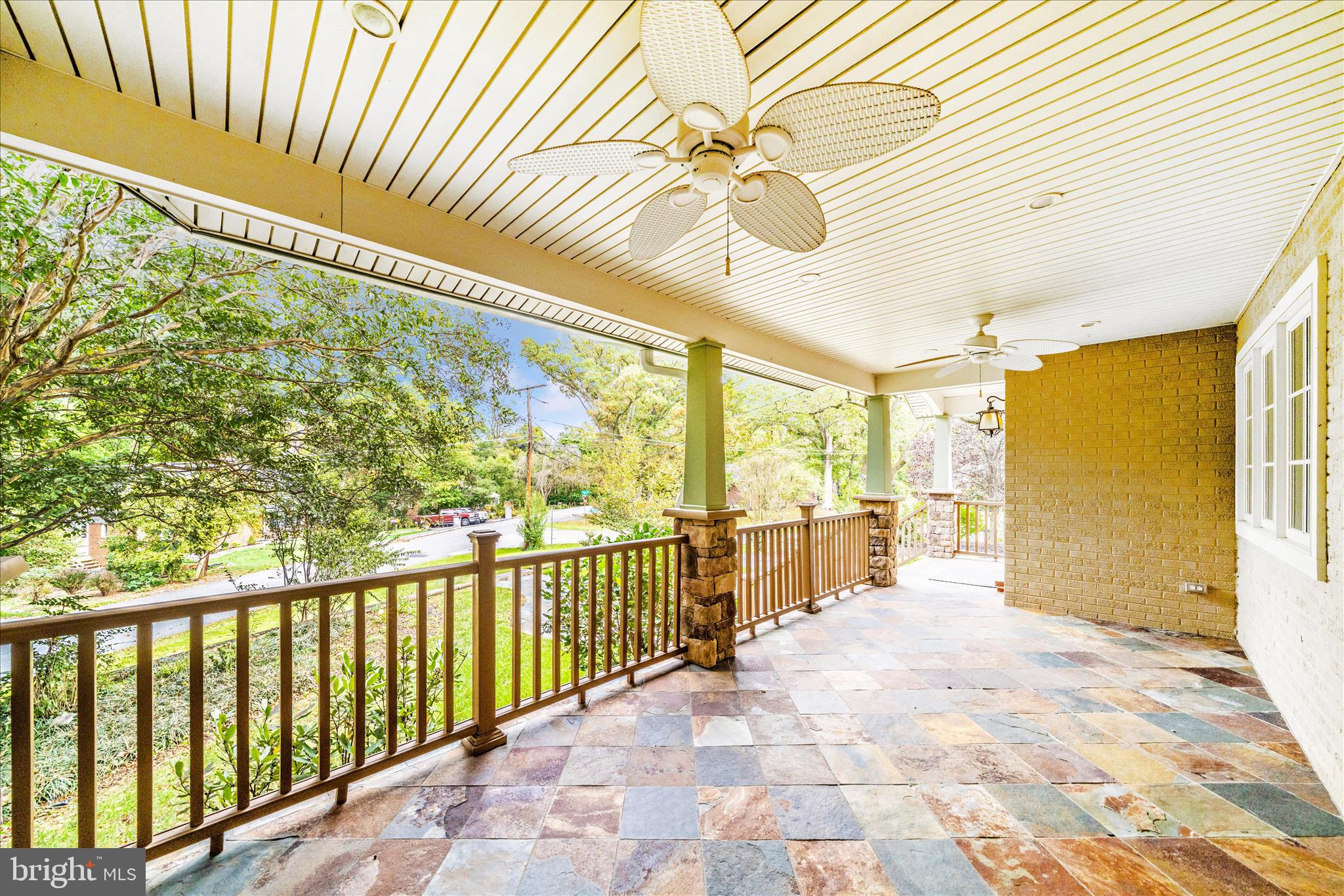 1925 Pagebrook Road Silver Spring, MD 20903 - Photo 59 of 60 a view of a porch with a table and chairs