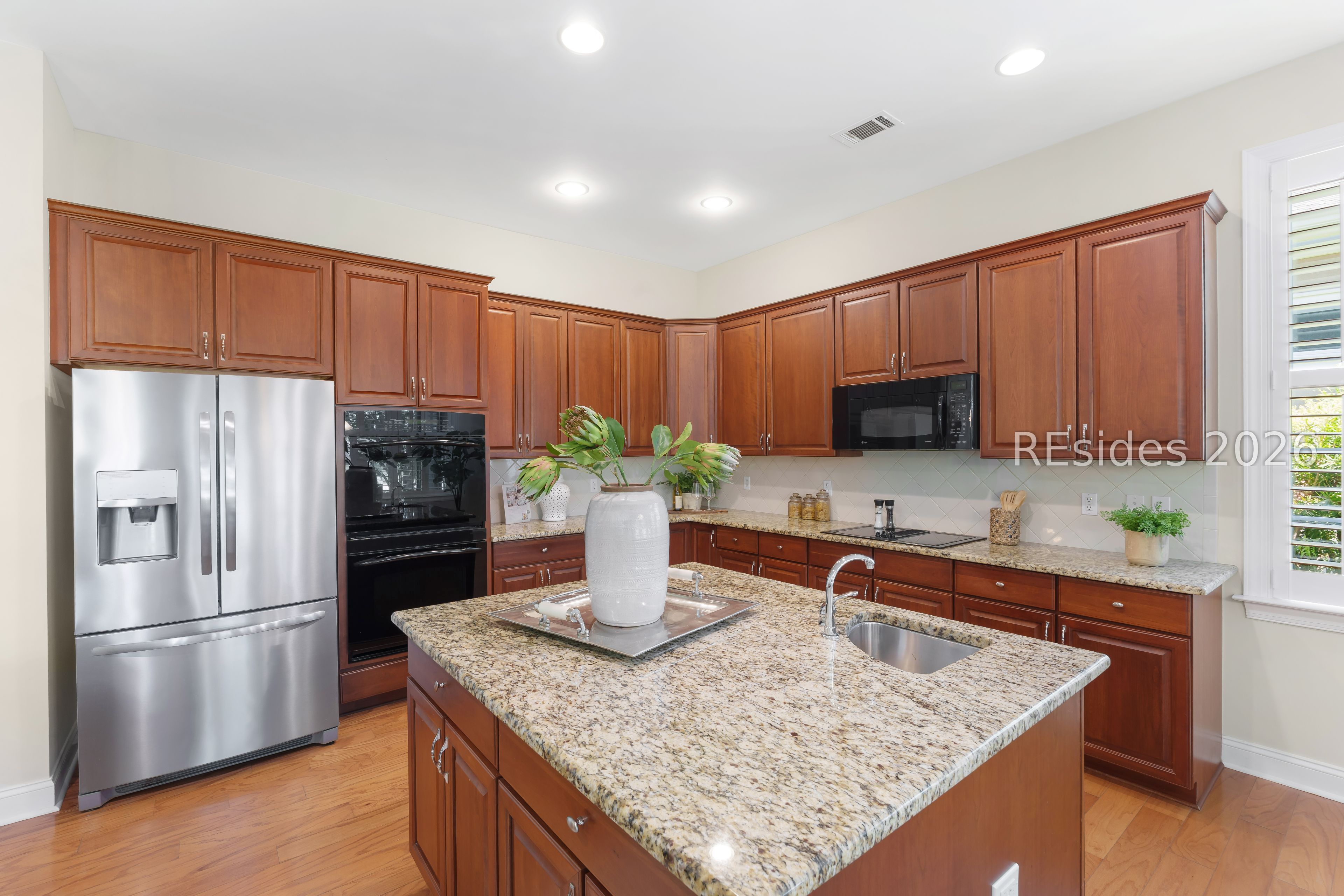 20 Chadbourne Street Bluffton, SC 29910 - Photo 7 of 29 Kitchen with large center island & cabinet space