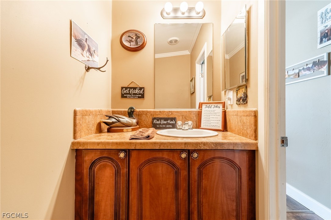 2032 Ortona Locks Road Moore Haven, FL 33471 - Photo 22 of 48 a utility room with dryer and washer