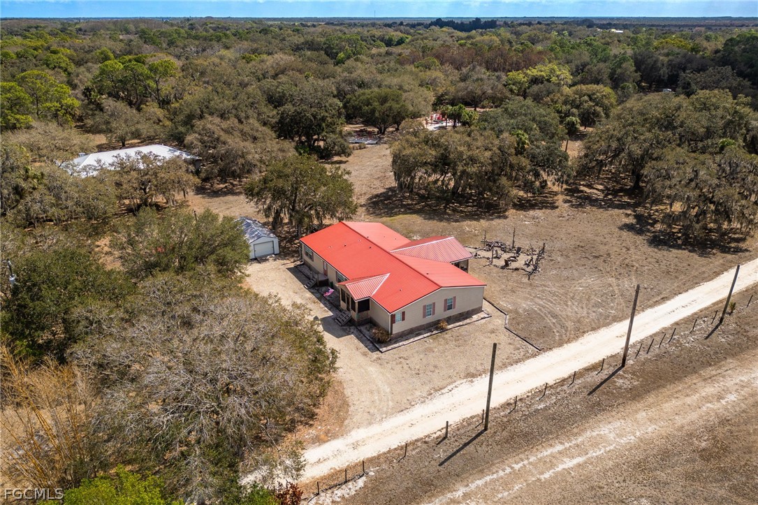 2032 Ortona Locks Road Moore Haven, FL 33471 - Photo 34 of 48 an aerial view of a tennis ground