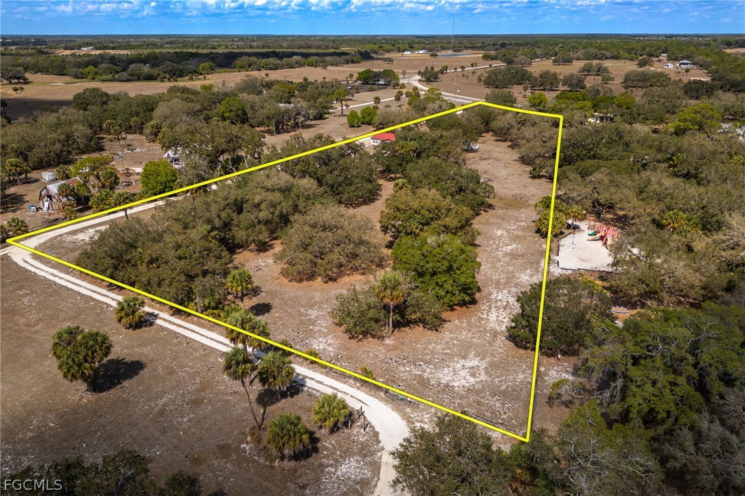 2032 Ortona Locks Road Moore Haven, FL 33471 - Photo 44 of 48 a view of a tennis court
