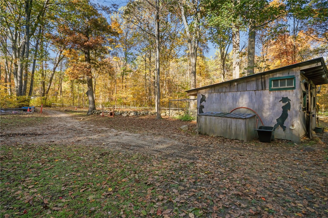 550 Twin Brook Lane Coventry, RI 02816 - Photo 36 of 41 Barn with electric fencing