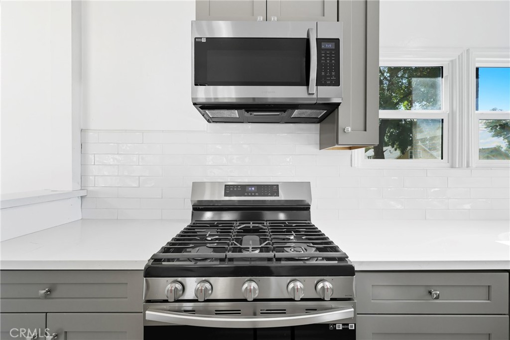 3841 Locust Street Riverside, CA 92501 - Photo 22 of 57 a stove top oven sitting inside of a kitchen