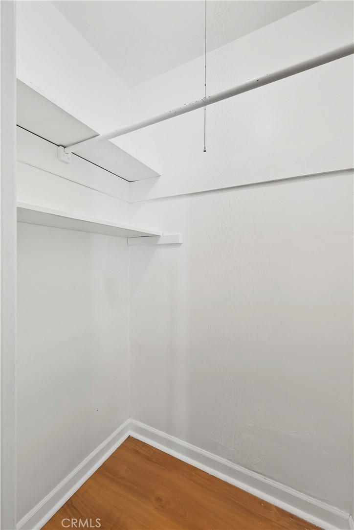 3841 Locust Street Riverside, CA 92501 - Photo 40 of 57 a view of a small space with racks on the wall