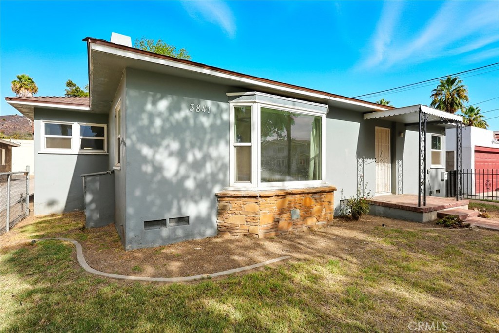 3841 Locust Street Riverside, CA 92501 - Photo 47 of 57 a view of a house with backyard and sitting area