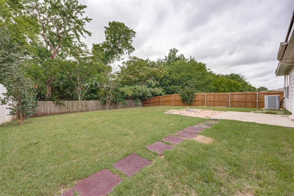 1601 Elm Street Anna, TX 75409 - Photo 22 of 25 a view of backyard with swimming pool and seating