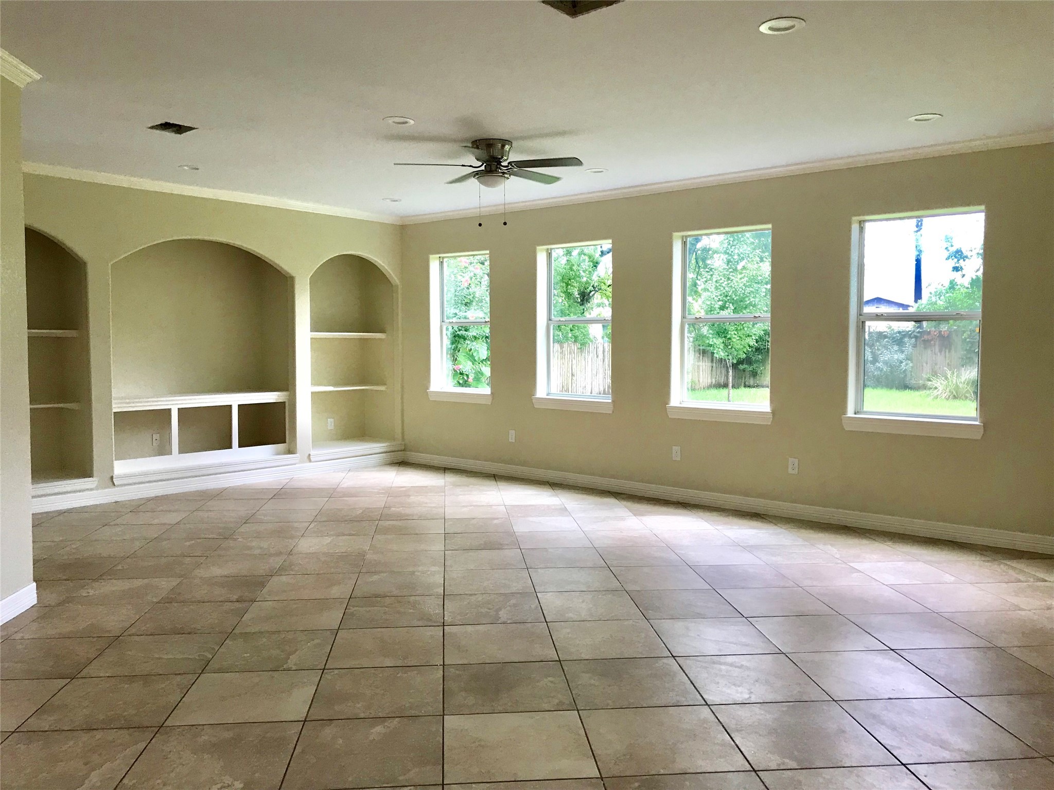 4925 Talina Way Houston, TX 77041 - Photo 8 of 12 a view of an empty room with a window